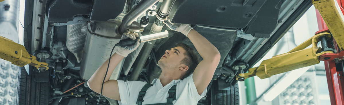 Mechanic doing an MOT inspection - MOT Huddersfield