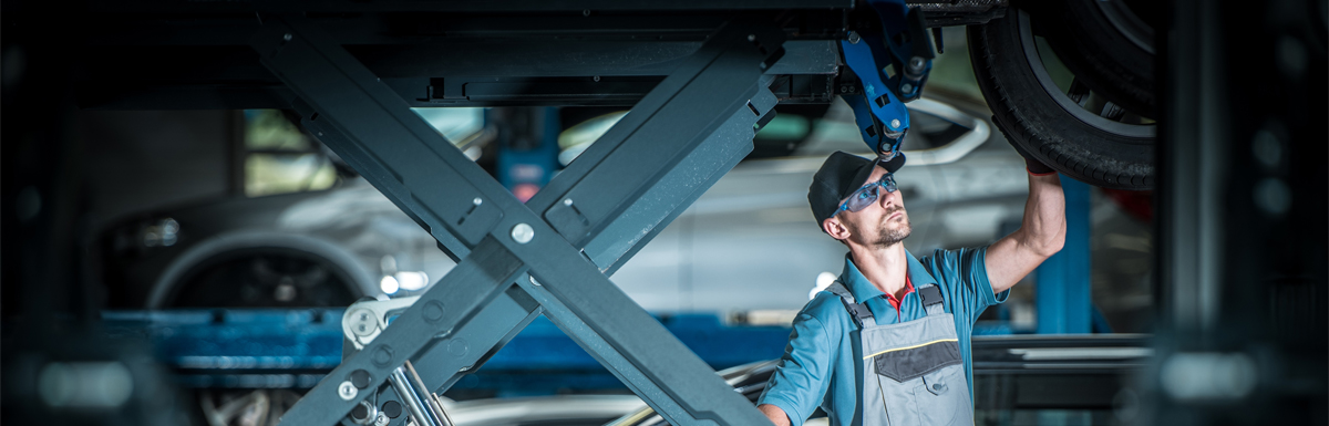 Mechanic doing repair work on a vehicle - Car Repairs Huddersfield